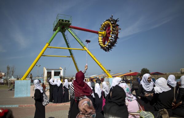 Жительницы сектора Газа принимают участие в празднованиях, организованных ООН по случаю Международного женского дня - Sputnik Таджикистан