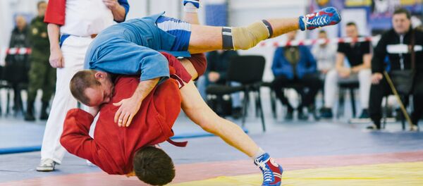 Турнир по самбо, архивное фото Турнир по самбо, архивное фото - Sputnik Тоҷикистон