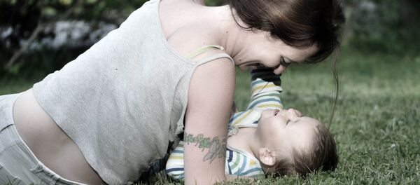 Тифл ва модар. Акс аз бойгонӣ Тифл ва модар. Акс аз бойгонӣ - Sputnik Тоҷикистон