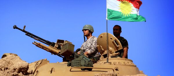 Военные с флагом Курдистана. Архивное фото - Sputnik Тоҷикистон