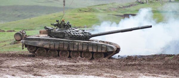 Танк дар майдони разм. Акс аз бойгонӣ Танк дар майдони разм. Акс аз бойгонӣ - Sputnik Тоҷикистон