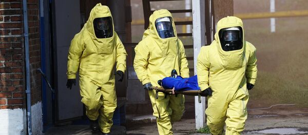 Учения по ликвидации утечки опасных химических веществ. Архивное фото Учения по ликвидации утечки опасных химических веществ. Архивное фото - Sputnik Тоҷикистон