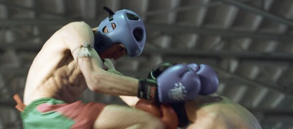 Схватка кикбоксеров. Архивное фото Схватка кикбоксеров. Архивное фото - Sputnik Таджикистан