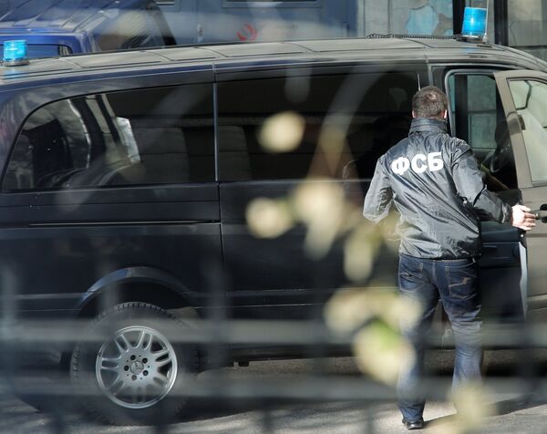 Сотрудник Федеральной Службы Безопасности России, архивное фото Сотрудник Федеральной Службы Безопасности России, архивное фото - Sputnik Таджикистан