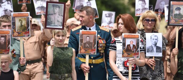 Дар пойгоҳи 201-ум 9 май бо роҳпаймоии Полки Ҷовидон ва консерт ҷашн гирифта шуд - Sputnik Тоҷикистон