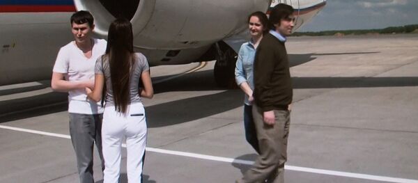 Прилет Е. Ерофеева и А. Александрова в Москву - Sputnik Таджикистан