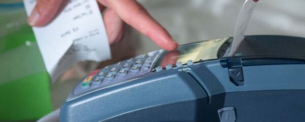 Платежный терминал. Архивное фото Платежный терминал. Архивное фото - Sputnik Таджикистан