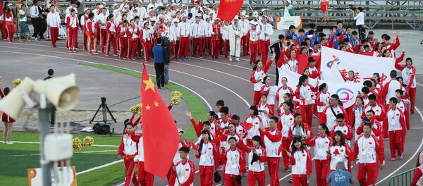 6 июля 2016. Парад атлетов на открытии VI Международных спортивных игр Дети Азии на стадионе Туймаада в Якутске. - Sputnik Таджикистан