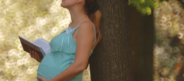 Беременная девушка. Архивное фото - Sputnik Таджикистан