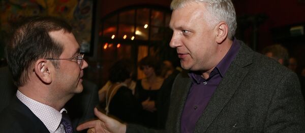 Юрий Ровенский (аз тарафи чап) ва Павел Шеремет (аз тарафи рост). Акс аз бойгонӣ Юрий Ровенский (аз тарафи чап) ва Павел Шеремет (аз тарафи рост). Акс аз бойгонӣ - Sputnik Тоҷикистон