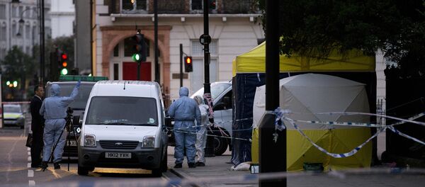 Полиция Лондона работает на месте происшествия, где неизвестный напал на прохожих с ножом в ночь на 4 августа Полиция Лондона работает на месте происшествия, где неизвестный напал на прохожих с ножом в ночь на 4 августа - Sputnik Таджикистан