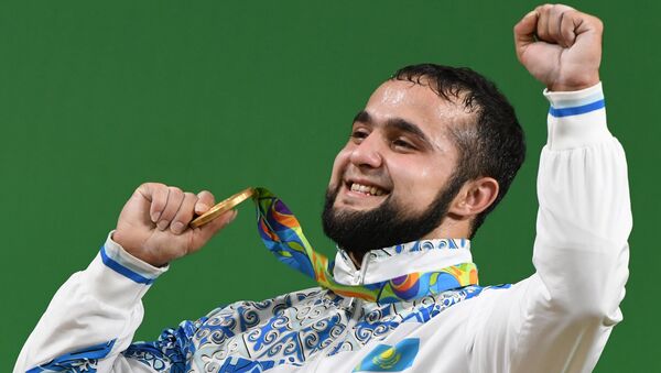 Казахстанский спортсмен Ниджат Рагимов занял первое место на соревнованиях по тяжелой атлетике на Олимпийских играх в Рио-де-Жанейро - Sputnik Таджикистан
