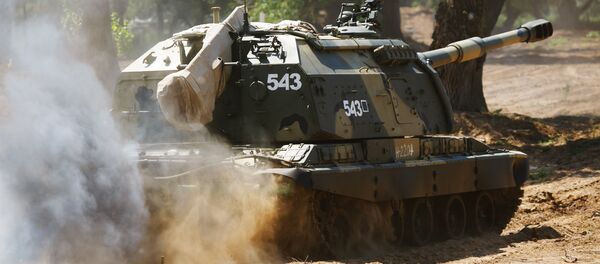 Самоходная артиллерийская установка 2С19 МСТА-С. Архивное фото Самоходная артиллерийская установка 2С19 МСТА-С. Архивное фото - Sputnik Таджикистан
