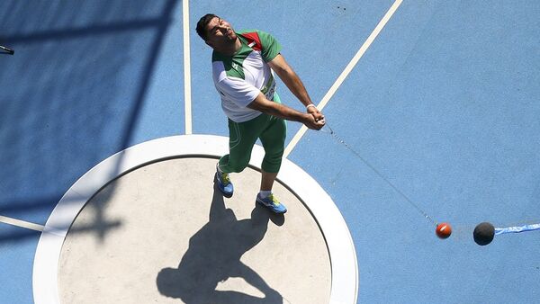 Дильшод Назаров метает молот на Олимпийских играх в Рио-де-Жанейро - Sputnik Таджикистан