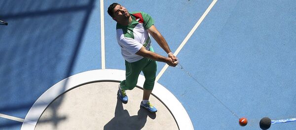 Дильшод Назаров метает молот на Олимпийских играх в Рио-де-Жанейро - Sputnik Таджикистан