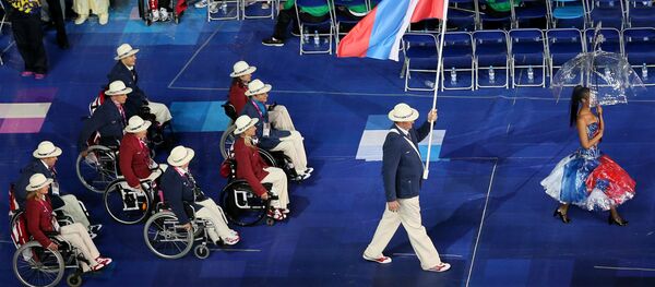 Паралимпийская сборная России на церемонии открытия ХIV летних Паралимпийских игр на Олимпийском стадионе в Лондоне. Паралимпийская сборная России на церемонии открытия ХIV летних Паралимпийских игр на Олимпийском стадионе в Лондоне. - Sputnik Таджикистан
