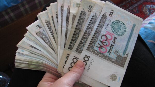 Узбекская валюта сум, архивное фото - Sputnik Таджикистан