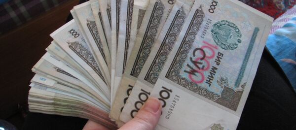 Узбекская валюта сум. Архивное фото Узбекская валюта сум. Архивное фото - Sputnik Таджикистан