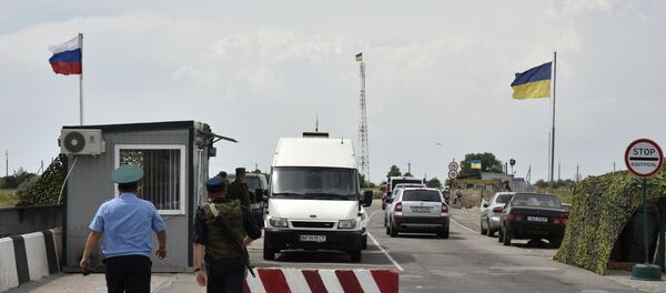 Автомобили на на границе России и Украины. Архивное фото Автомобили на на границе России и Украины. Архивное фото - Sputnik Таджикистан