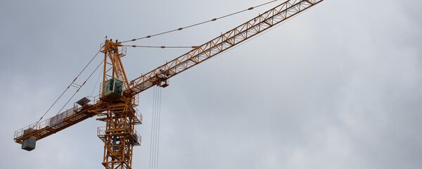 Башенный кран. Архивное фото - Sputnik Тоҷикистон