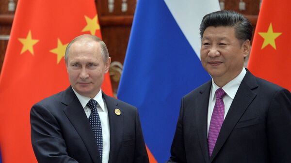 Президент РФ Владимир Путин и председатель КНР Си Цзиньпин на саммите G20 - Sputnik Таджикистан