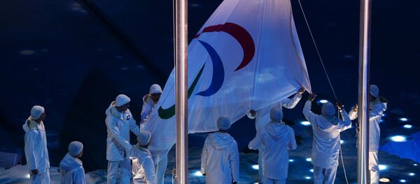 Паралимпийский флаг. Архивное фото Паралимпийский флаг. Архивное фото - Sputnik Таджикистан