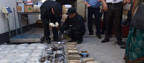 Церемония сжигания наркотиков в Таджикистане - Sputnik Тоҷикистон