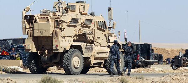 Машинаи ҳарбии ИМА дар Мосул - Sputnik Тоҷикистон