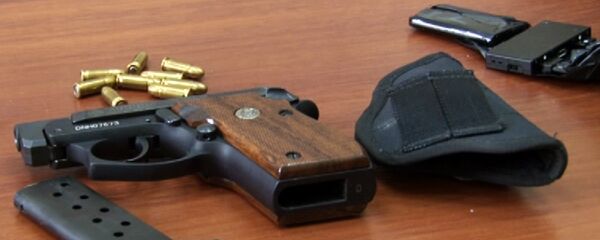 Пистолет с патронами, архивное фото - Sputnik Таджикистан