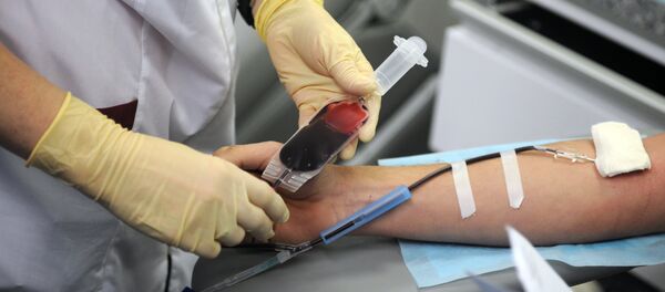 Лабораторияи мобилӣ барои супоридани хун. Акс аз бойгонӣ - Sputnik Тоҷикистон