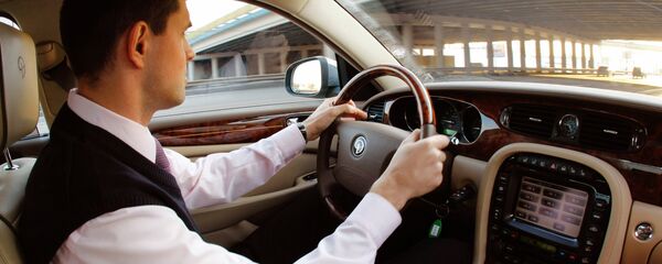 В салоне автомобиля, архивное фото - Sputnik Тоҷикистон