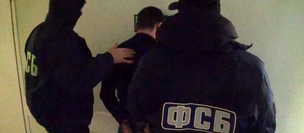 Задержание подозреваемых, архивное фото Задержание подозреваемых, архивное фото - Sputnik Тоҷикистон