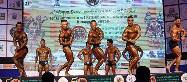 Чемпионат по бодибилдингу, архивное фото Чемпионат по бодибилдингу, архивное фото - Sputnik Таджикистан