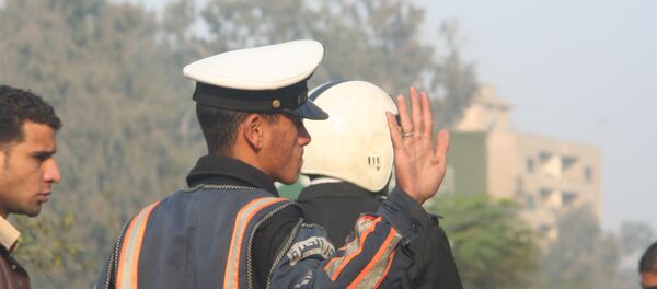 Египетский полицейский, архивное фото Египетский полицейский, архивное фото - Sputnik Таджикистан
