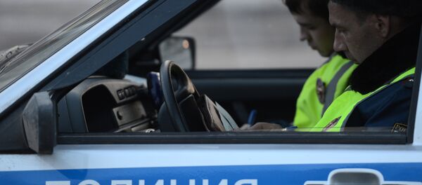 Сотрудники дорожно-патрульной службы ГИБДД, архивное фото Сотрудники дорожно-патрульной службы ГИБДД, архивное фото - Sputnik Таджикистан