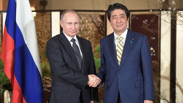 Официальный визит президента РФ В. Путина в Японию - Sputnik Таджикистан