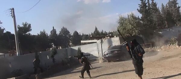 Боевики Исламского государства в городе Кобани, Сирия Боевики Исламского государства в городе Кобани, Сирия - Sputnik Тоҷикистон