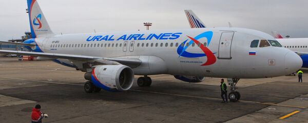 Самолет компании Уральские авиалинии, архивное фото - Sputnik Тоҷикистон