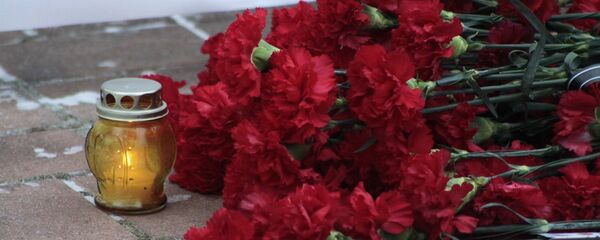 Траур по погибшим пассажирам самолета Ту-154 - Sputnik Тоҷикистон