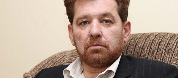 Заведующий отделом Средней Азии и Казахстана Института стран СНГ Андрей Грозин, архивное фото - Sputnik Тоҷикистон