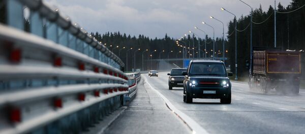 Автомобили на федеральной автомобильной дороге, архивное фото Автомобили на федеральной автомобильной дороге, архивное фото - Sputnik Таджикистан