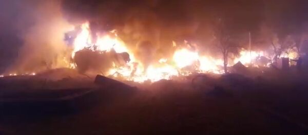 Первые минуты после крушения самолета — видео очевидца катастрофы Первые минуты после крушения самолета — видео очевидца катастрофы - Sputnik Таджикистан