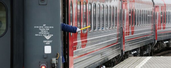 Поезд ОАО РЖД, архивное фото Поезд ОАО РЖД, архивное фото - Sputnik Тоҷикистон