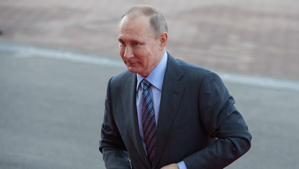 Президент РФ Владимир Путин, архивное фото - Sputnik Тоҷикистон