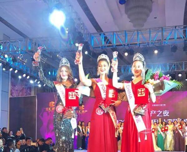 Восемнадцатилетняя модель из Таджикистана Ёсуман Холова стала первой вице-мисс международного конкурса красоты Miss Global Tourism - Sputnik Таджикистан