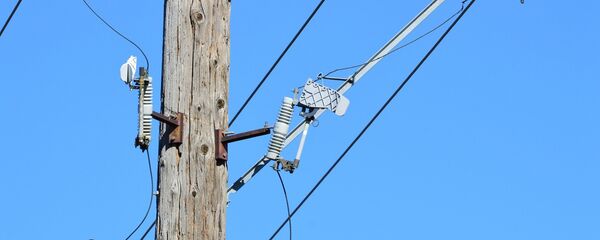 Телефонный столб с проводами. - Sputnik Тоҷикистон