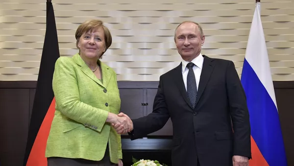 2 мая 2017. Президент РФ Владимир Путин и федеральный канцлер ФРГ Ангела Меркель во время встречи. - Sputnik Тоҷикистон