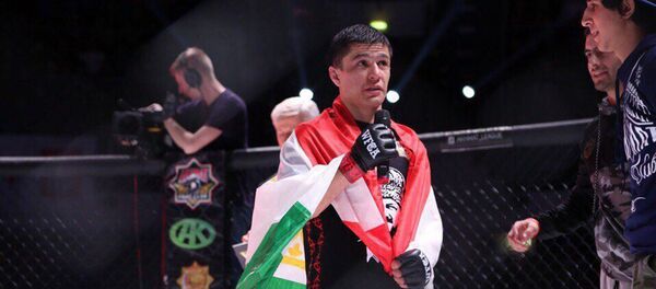 Таджикский боец Азам Гафоров - Sputnik Тоҷикистон