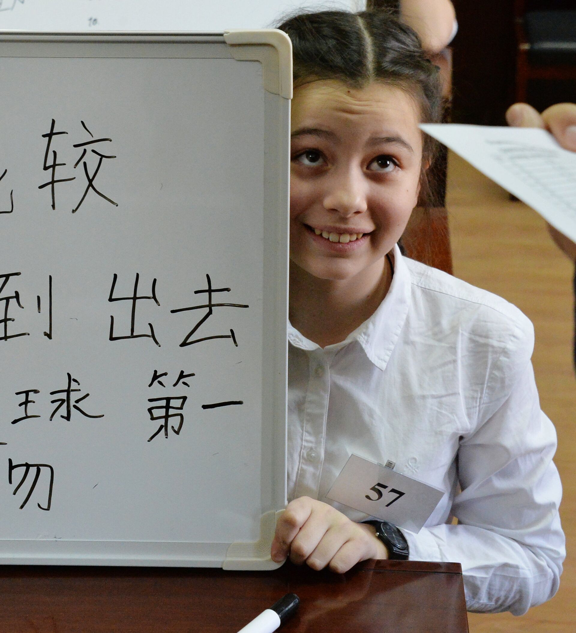 Русско китайский обучение. Китайский язык. Дети учат китайский язык. Китайские дети. Учитель китайского языка.