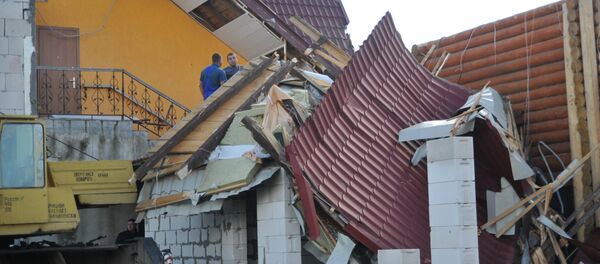 Ураган разрушил крыши домов, архивное фото - Sputnik Тоҷикистон